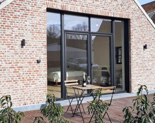 Hoogboeregem Apartment | Komo Hill Stays - guestroom Komo Cosy