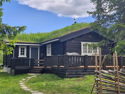 Svingvoll Cabin | Koselig familiehytte sentralt på Skeikampen til leie