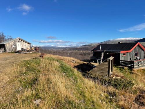 Dovre House | Koselig hytte med uthus på vakre Dovrefjell