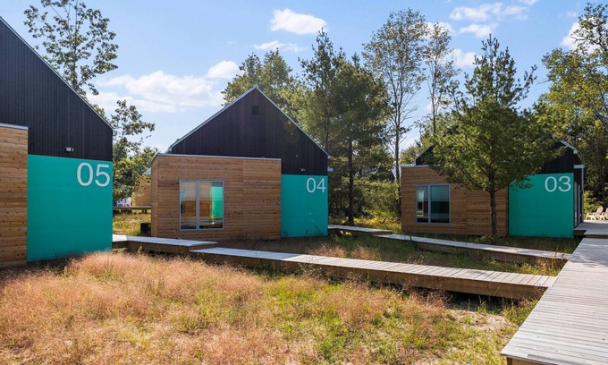Acme House | KOTI 4 (Two Bedroom) Traverse City's Scandinavian Cabins, vacation home on TART & mins to Traverse C.