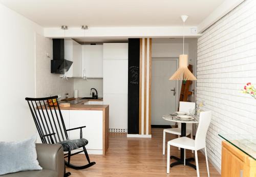 gmina Parzeczew Apartment | Krynica Apartamenty - Apartament typu studio Źródlana