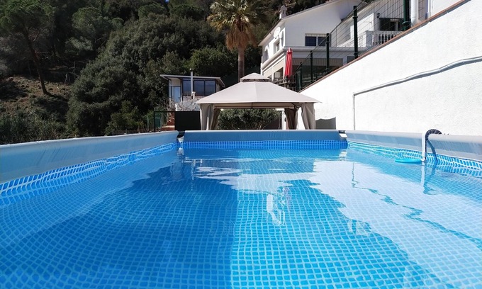 Argentona Ski Chalet | Kybalion Space. House in the mountains near Barcelona.