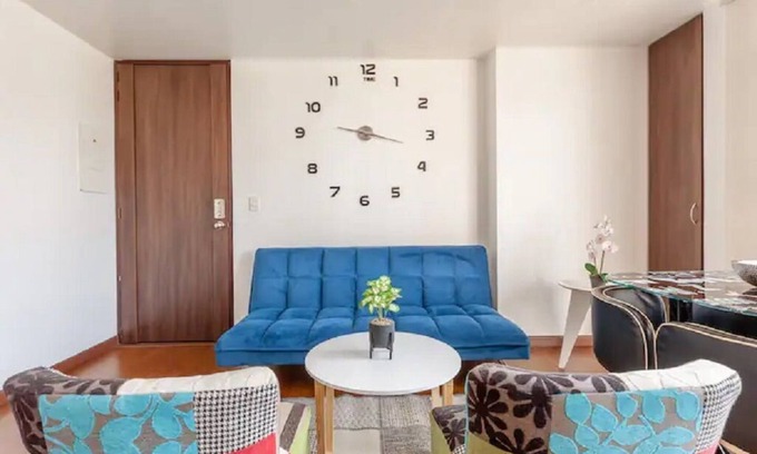Usaquen Apartment | La Calleja Warm and Illuminated