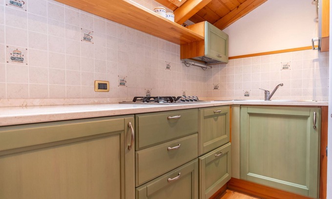 Alleghe Apartment | La Casa di Elvira-Mansarda