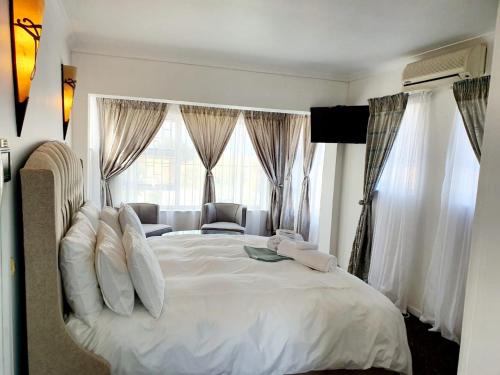 Bluewater Bay House | La Grace Executive Guesthouse