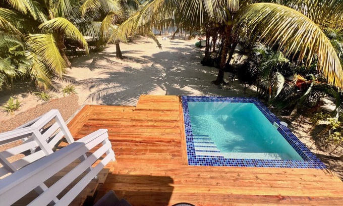 Caribbean Way House | La Vida Casita - Cozy beachfront bungalow steps from the beach.