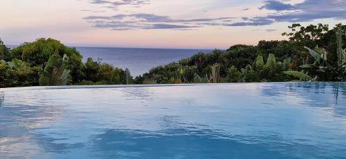 Nosy Boraha Villa | La VILLA ANKARENA Dans un domaine forestier tropical, VILLA ENTIERE avec PISCINE PRIVEE, Wifi, TV, personnels inclus Plage à 5 minutes à pieds