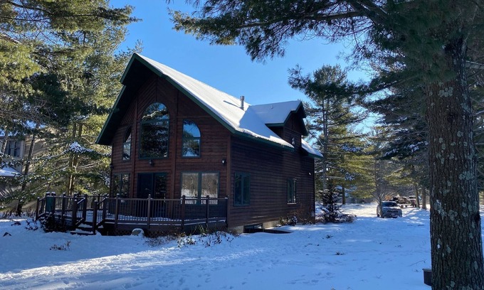 Holcombe House | Lake cabin on Holcombe flowage. Loft views, fire pit, and nearby hiking.
