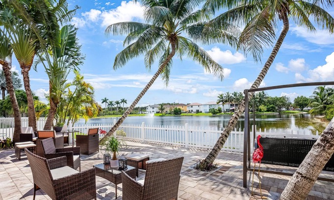 Tamiami House | Lake front, Billiard room, Large patio, Pet-friendly, BBQ, Safe Neighborhood
