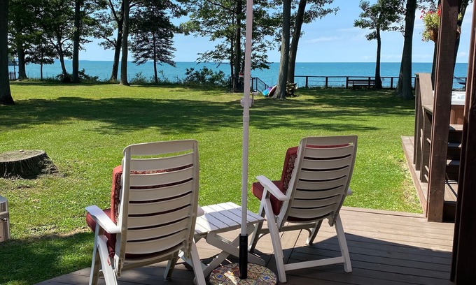Irving House | Lake Front Home. Private stairs to private beach and bay. upscale 5 bedroom home
