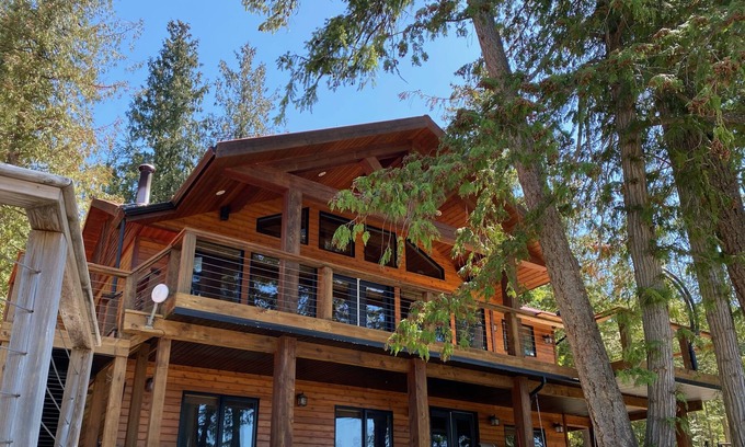 Eagle Bay Cottage | Lake Front Paradise! With Multiple Decks, Fire Pit, hot Tub, Dock, Bouy
