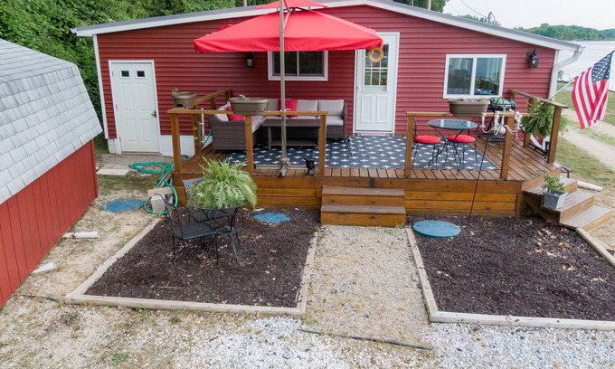Dowling Cottage | Lake front property with a relaxing front deck overlooking Bristol Lake