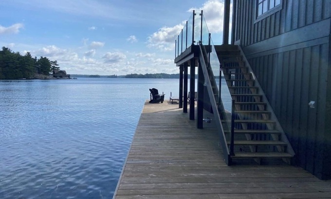 Muskoka Lakes Cottage | Lake Joseph Luxury Rental with 2-story Boathouse. Tennis & Pickleball Optional.
