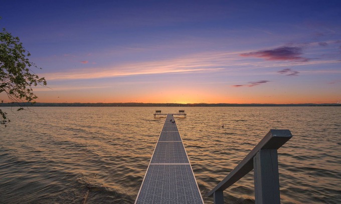 Traverse City Cottage | Lake Leelanau Cottage with Stunning Sun Set Views. 10 Miles from TC!