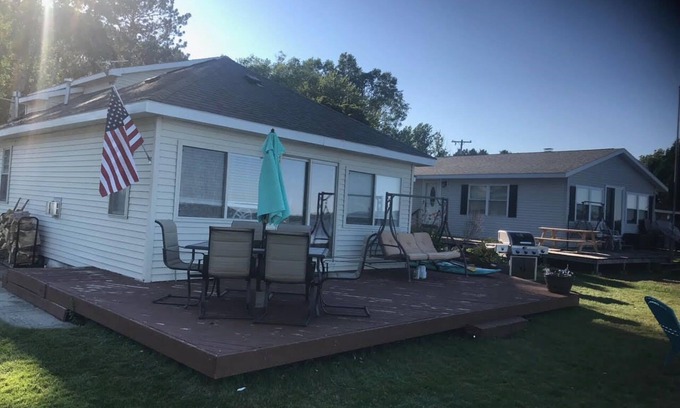 Cadillac House | Lake Mitchell Lakefront Rental, very sandy lakefront. great ice fishing lake