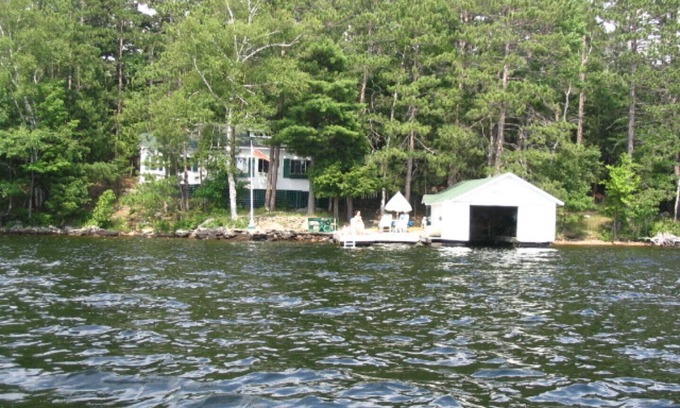 Lake of Bays Cottage | Lake of Bays - patio and deck at waters edge, sun all day from 11:00 AM.