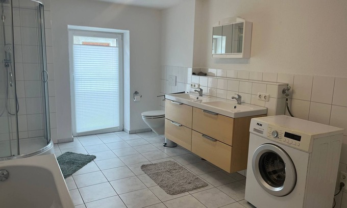 Ammerland Apartment | Lake Starnberg: Maisonette with wood-burning stoves, balcony, bathrooms