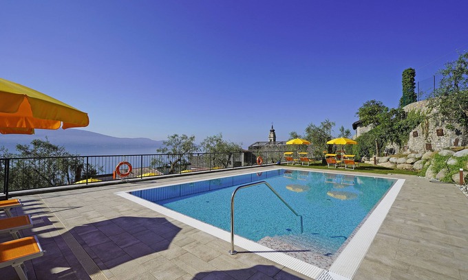 Gargnano Condo | lake view apartment quiet location parking and swimming pool in the olive trees.