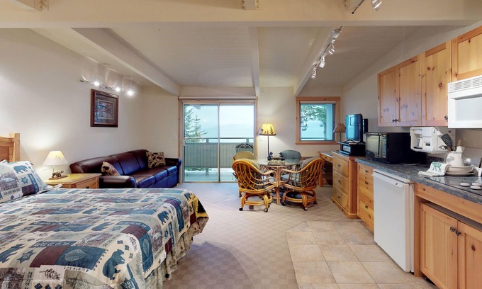 Polson Apartment | Lake view studio with private balcony, AC, dock for kayaking & swimming