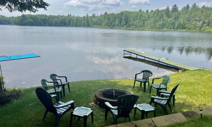 Traverse City House | Lakefront cabin on Bass Lake near Traverse City. Pets ok. Fire pit. Grill.