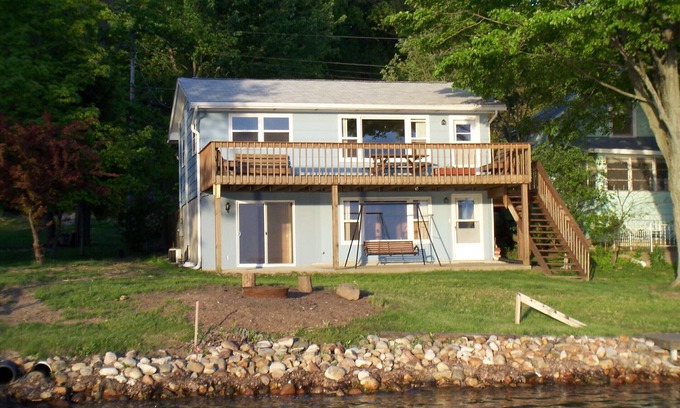 Angola Cottage | Lakefront cottage on first basin of Lake James. Dock, sandy bottom, great sunset