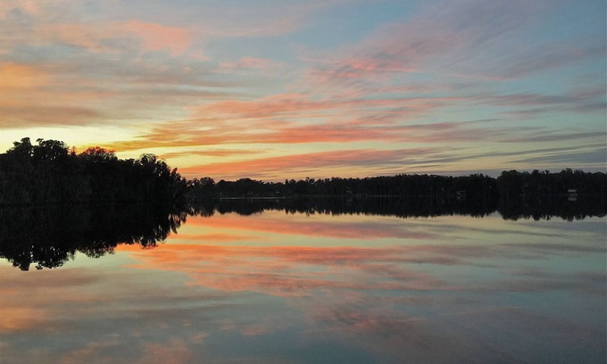 Greater Northdale Cottage | Lakefront Cottage with Gorgeous Sunset Views and Fishing from the Dock