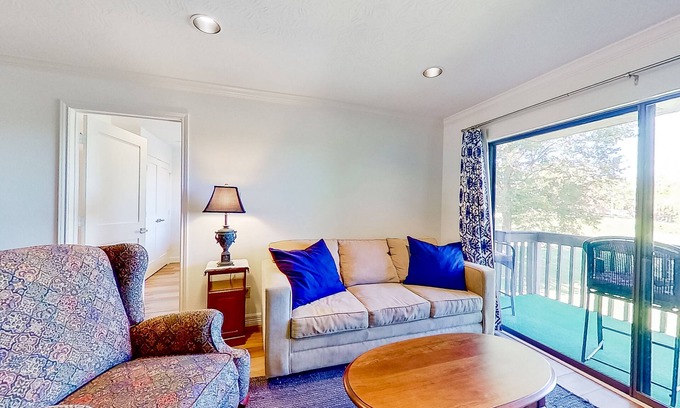 Walden on Lake Conroe Condo | Lakefront dog-friendly condo with lake views, pool, BBQ area, balcony, elevators