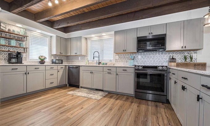 Oakland House | Lakefront, dog friendly, dock slip, hot tub, and fire pit