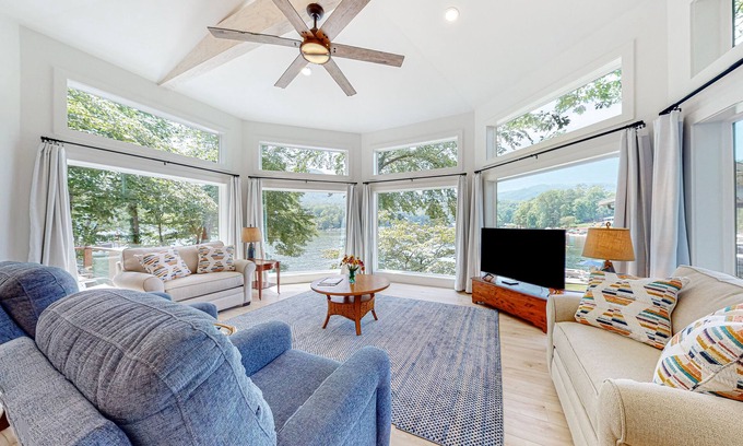 Lake Lure Cottage | Lakefront dream stay with dock, three kayaks, paddleboard, & grill - near golf