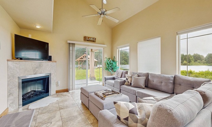 Rockaway Beach House | Lakefront end townhouse with kayaks & fishing dock, walk to beach - dogs welcome