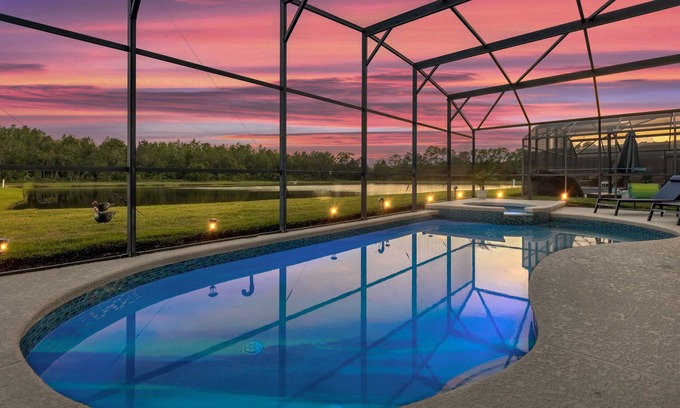 Kissimmee Villa | Lakefront Family Getaway with Pool and Game Room. Minutes to Disney!