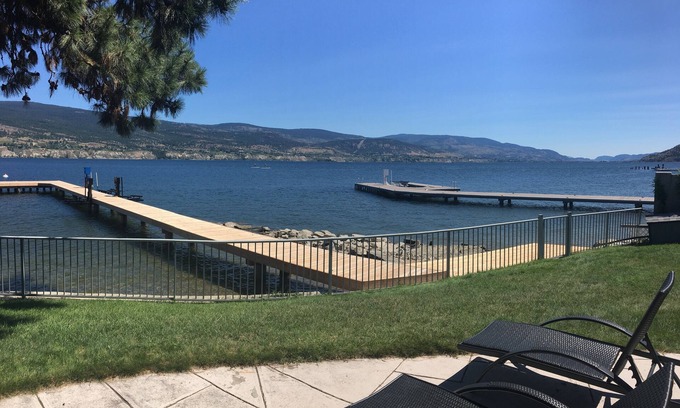 Okanagan-Similkameen House | Lakefront family oriented property -- flat, fully fenced 177 ft. beach front