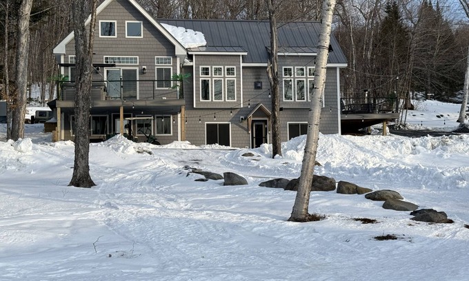 Greenville House | Lakefront family retreat close to town with hot tub, tiki bar and fire pits
