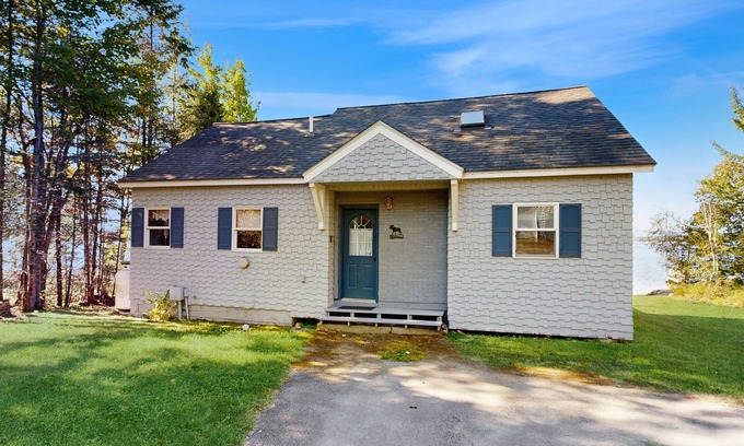 Greenville Cottage | Lakefront home with private dock, mooring, pebble beach, grill, & firepit