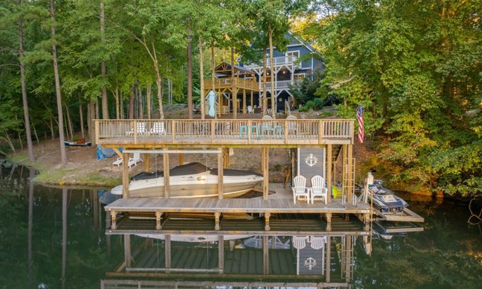 North Shore Acres House | Lakefront Home w/Pool, Lazy River, Dock, Firepit, Kayaks, Games, Pool Table
