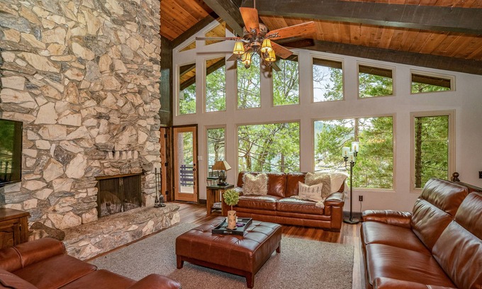 Bass Lake House | Lakefront home w/private boat dock, hot tub, gas grill, buoy, & wood fireplace
