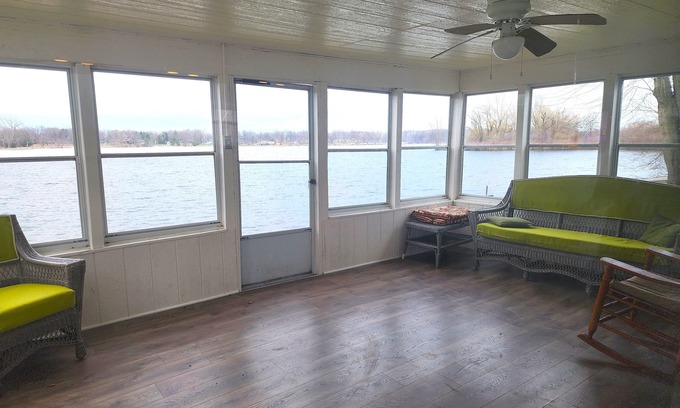 Coldwater House | Lakefront home w/Sunroom beach, kayaks, dock and laundry. 4 bd. Pet Friendly!