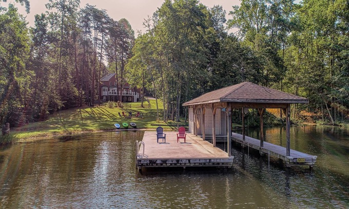 Lakeside Woods House | Lakefront home with boat dock, private firepit & game room - dog-friendly