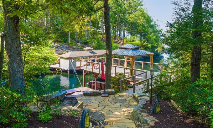 Mineral House | Lakefront home with granite counters, fireplace, lake views, & dock