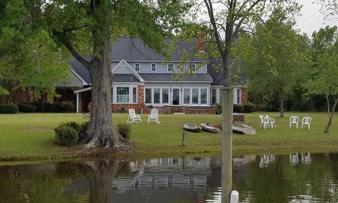 Summerton House | Lakefront Home with Private Dock and Outdoor Fireplace