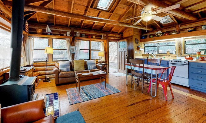 Eureka Springs Cabin | Lakefront log cabin with wrap-around deck, grill, wood stove & new kitchen