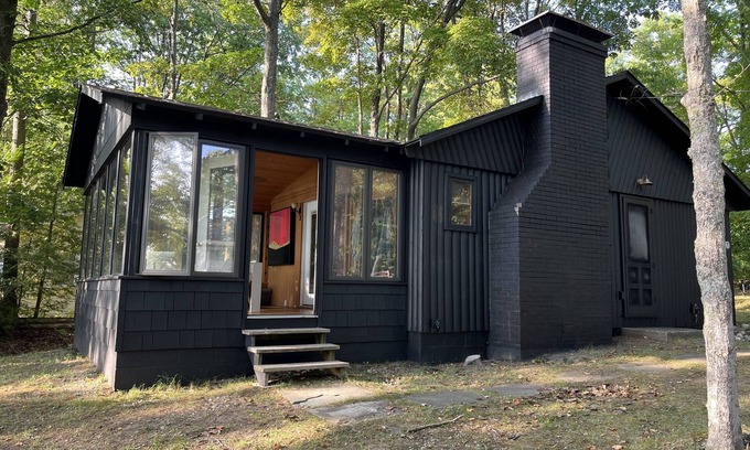 Carp Lake Cottage | Lakefront Log Cabin with Contemporary touches