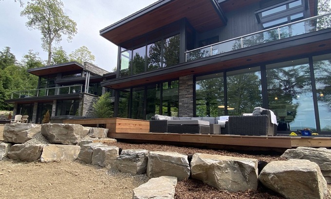 Dysart et al Cottage | Lakefront Luxury-Glass cottage, level lot, large dock, hot tub, private!