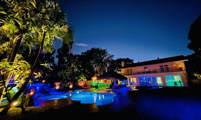Lake Worth House | Lakefront Oasis 6BD, Sleep 14, Heated Pool, Tikis, Golf, Dock on Lake, No Stairs