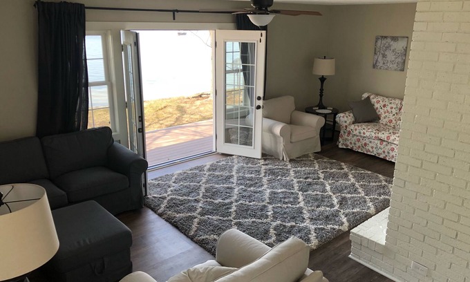Lake Odessa House | Lakefront property with A/C sleeps 8 with onsite pontoon available to rent.