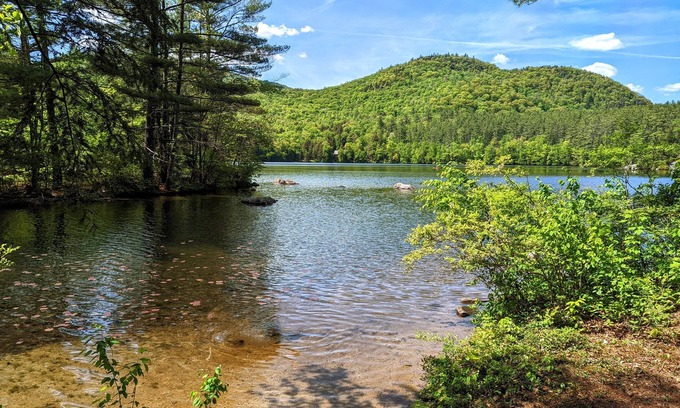 Woodstock House | Lakefront Retreat with Private Beach, Gourmet Kitchen, Game Room & Movie Space