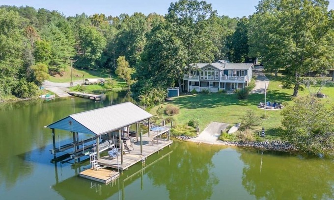 Goodview House | Lakefront Retreat with Game Room, Hot Tub, and Gym!