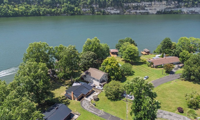 Ingles House | Lakefront retreat with private dock, open living, fire pit, full kitchen & cozy indoor spaces