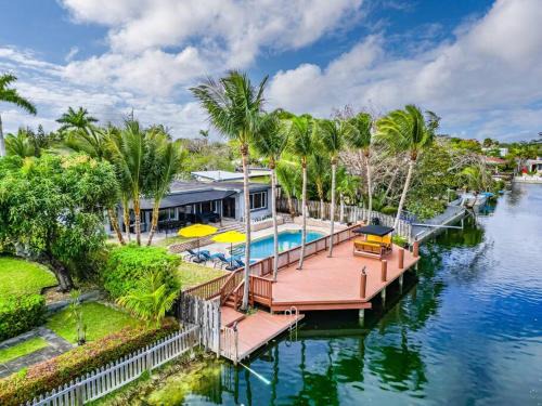 Poinsettia Heights Villa | Lakefront Villa with Heated Pool only 6 minutes to the Beach