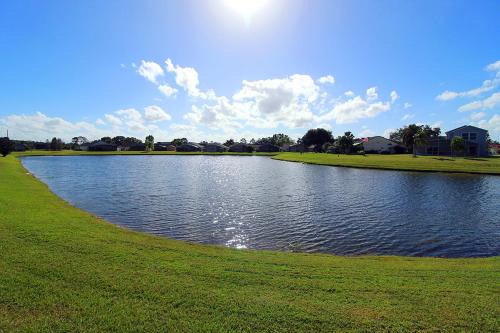 Crescent Lakes House | Lakefront Villa with private heated pool